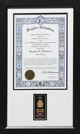 Importance of Items to be Framed custom framing example featuring Two Opening Mat with Medal m